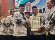 Ketua PGRI Pinrang Drs. Darmin, M.Si,  Bangga Terima Penghargaan dari PGRI Sulsel, Sukses Lunasi Iuran Anggota